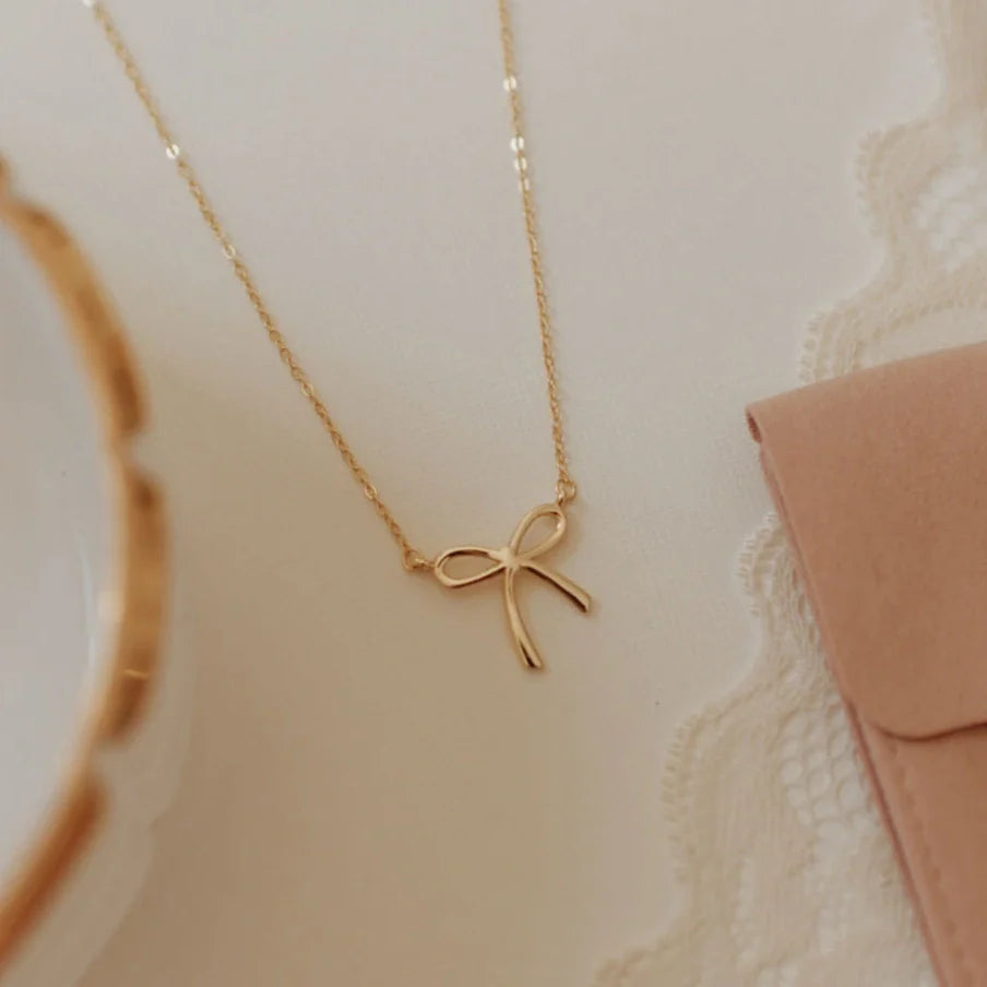 Lily Bow Necklace at Vogue Villa