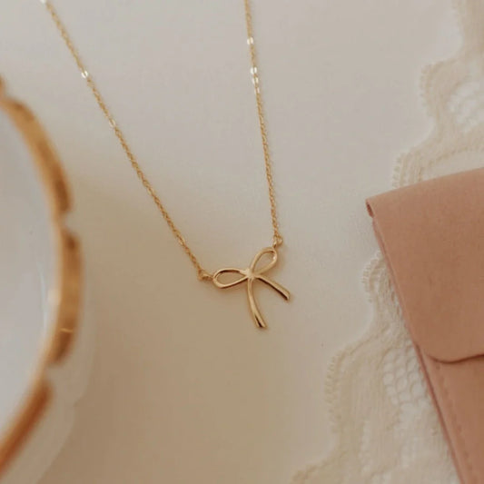 Lily Bow Necklace at Vogue Villa